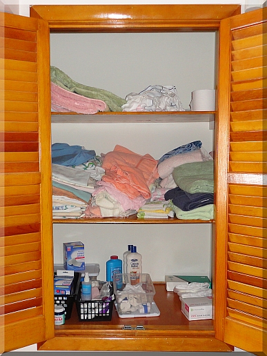 Andrews Estate Service Household Liquidation Specialists Linen Closet Shelves West Seneca NY 14224 Cluttered