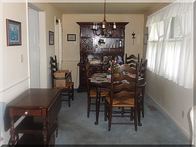 Andrews Estate Service Household Liquidation Specialists Dining Room North Wall Cluttered