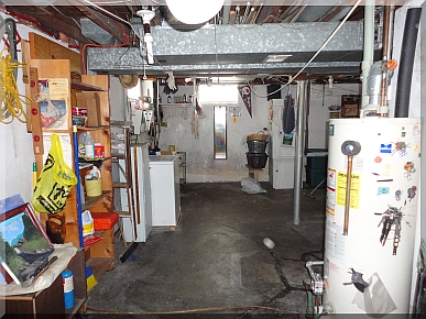 Andrews Estate Service Household Liquidation Specialists Basement Storage North Wall Cluttered